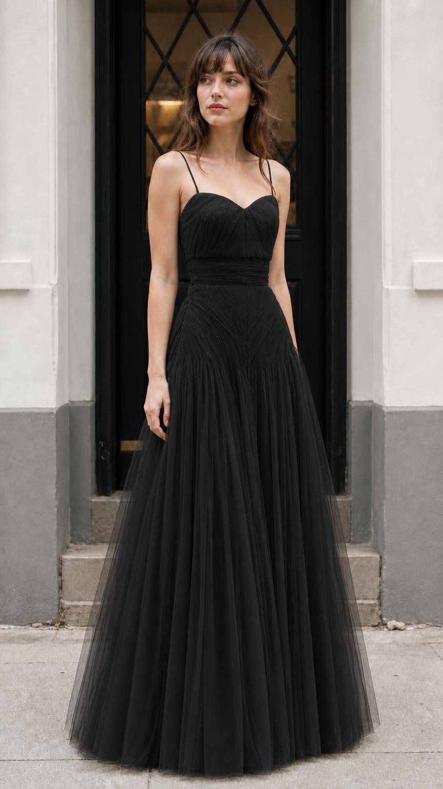 Front view of model wearing black tulle evening dress