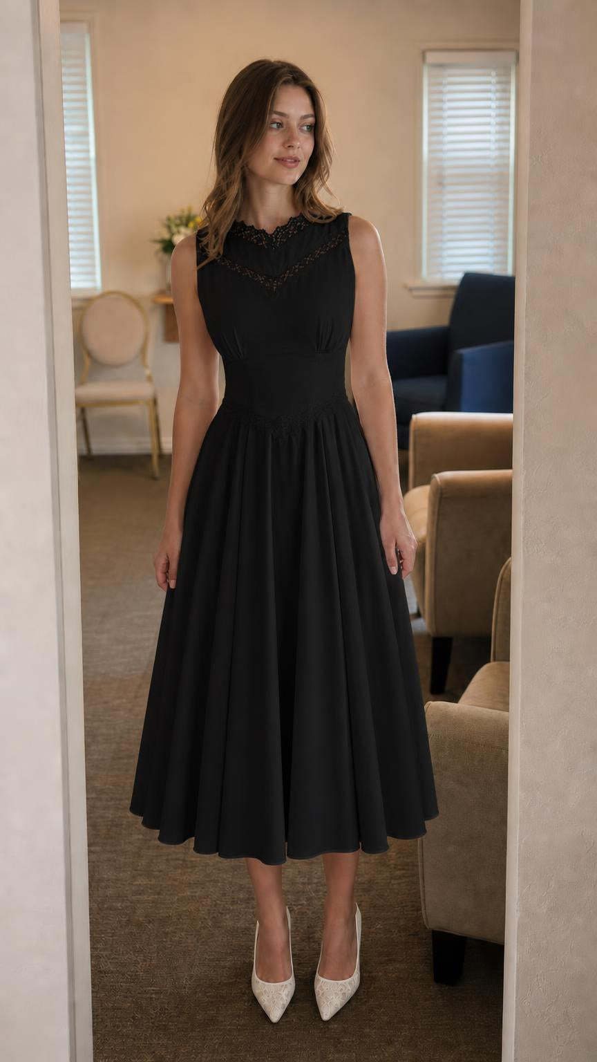 Front view of model wearing black lace trim midi dress