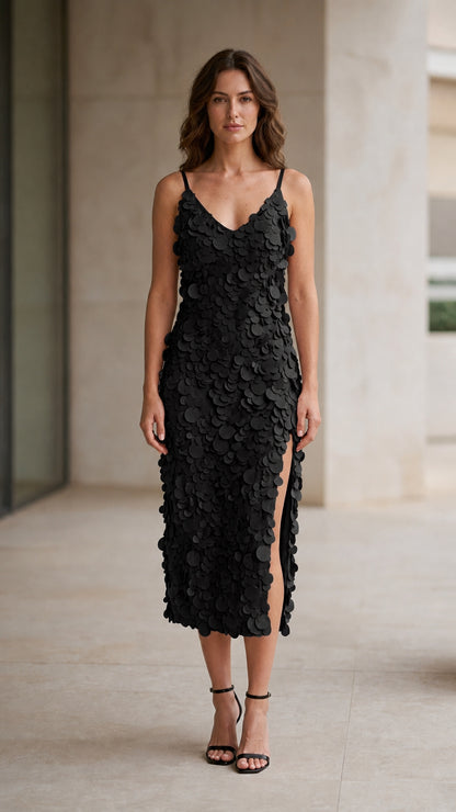 Model wearing black 3D petal applique midi dress