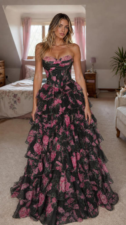 Front view of black floral strapless corset maxi dress