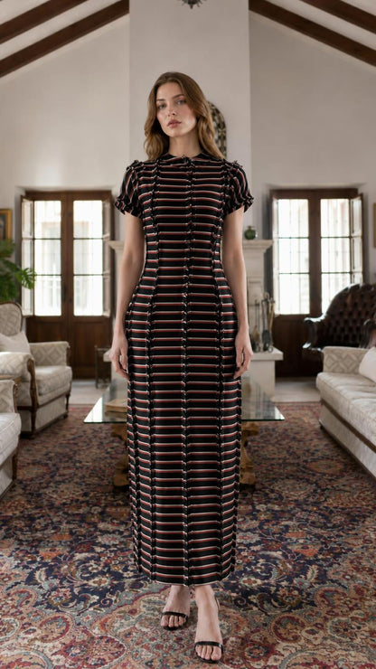 Model wearing black striped maxi dress variant