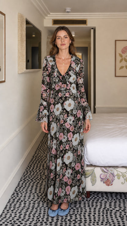 Model wearing black floral maxi dress variant