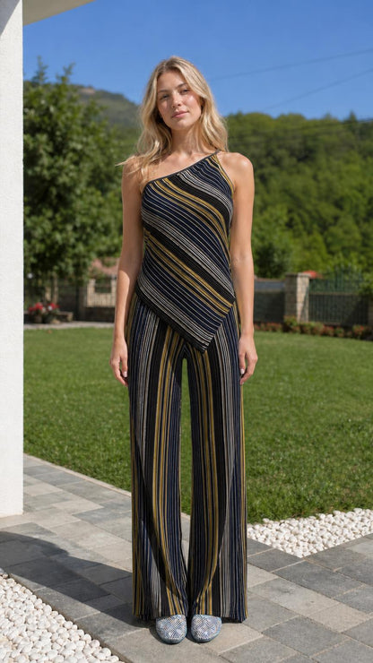 Front view of model wearing black multi striped two-piece set