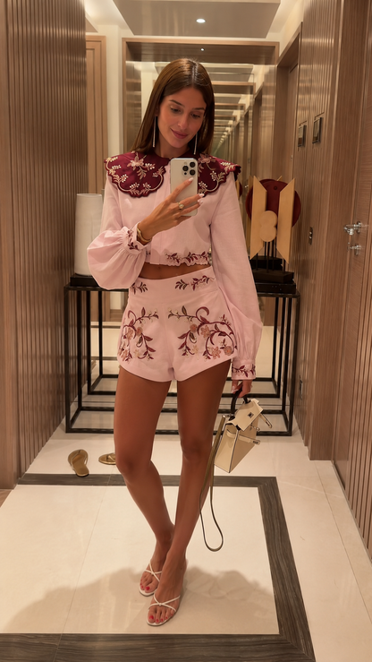 Front view of blush pink embroidered crop blouse and shorts set with contrast collar