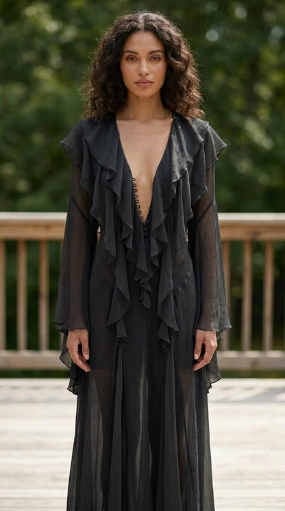 Model wearing black ruffle maxi dress