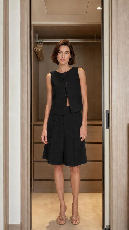 Front view of woman wearing black matching set