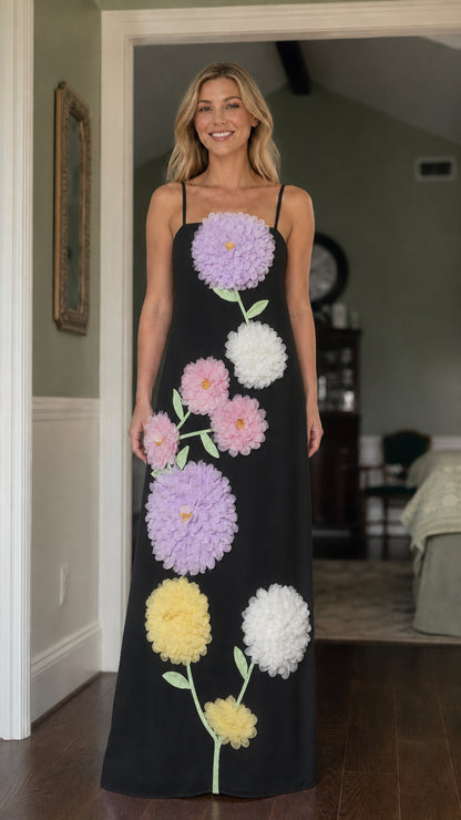 Front view of model wearing Black 3D floral maxi dress