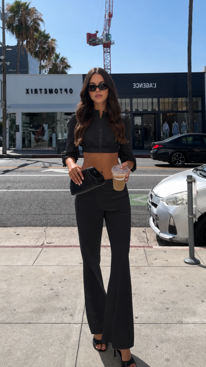 Front view of black cropped top and wide leg pants matching set
