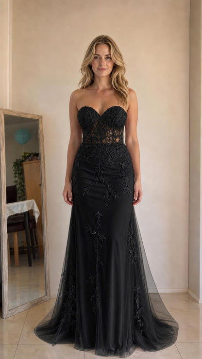 Front view of black strapless mermaid evening gown