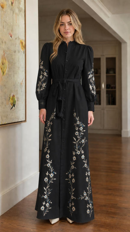 Front view of black floral embroidered maxi dress