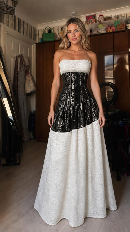 Front view of black strapless colorblock corset maxi dress