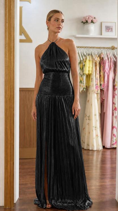 Front view of black metallic pleated halter maxi dress