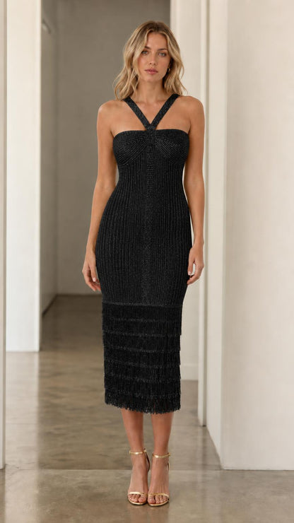 Model wearing black halter fringe midi dress, front view