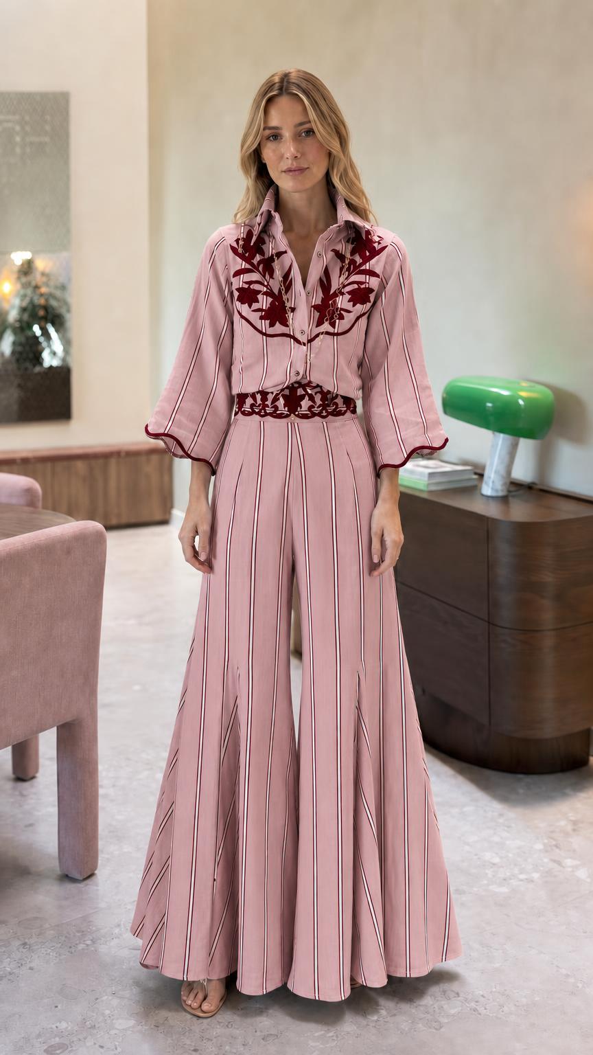 Front view of pink striped embroidered wide leg jumpsuit
