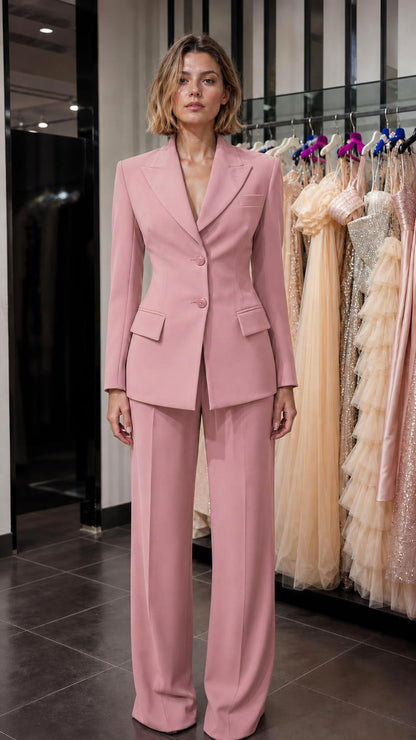 Front view of woman wearing pink tailored suit set