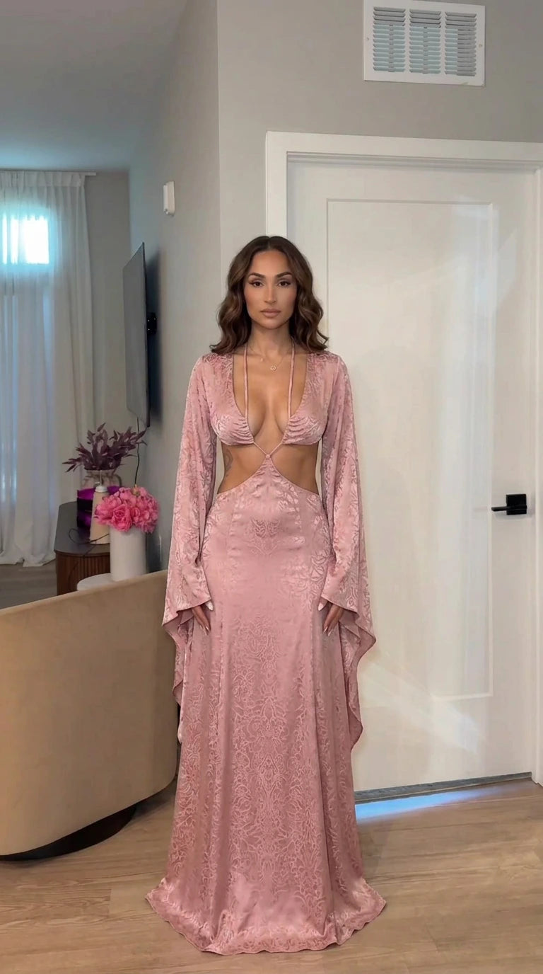 Front view of model wearing pink cutout maxi dress