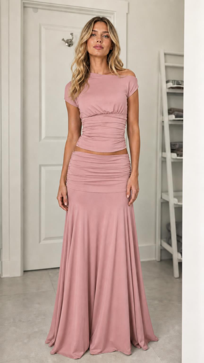 Model wearing dusty pink ruched two-piece set