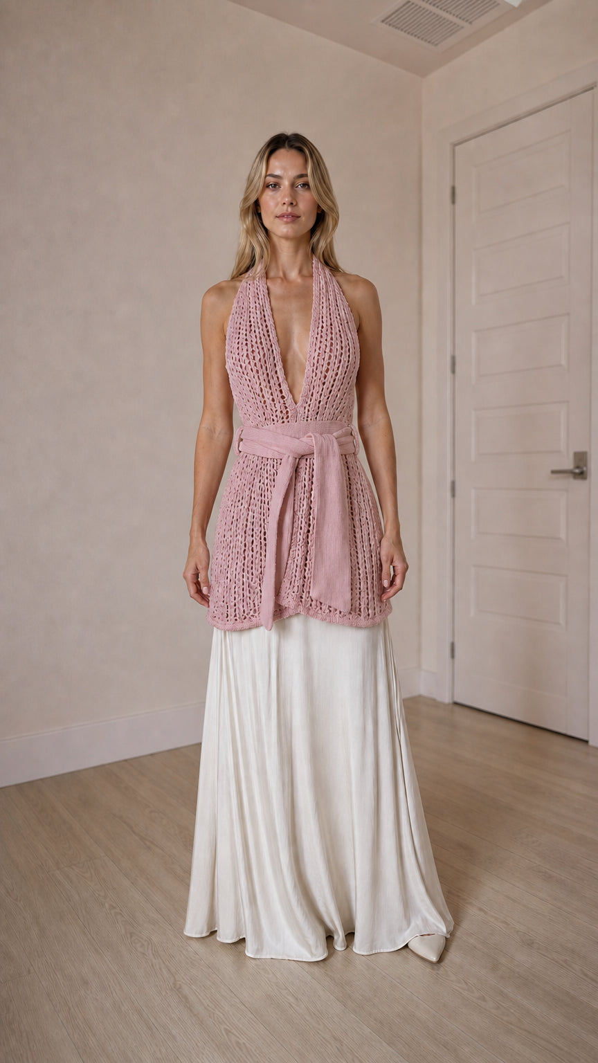 Front view of pink open knit halter top and maxi skirt set