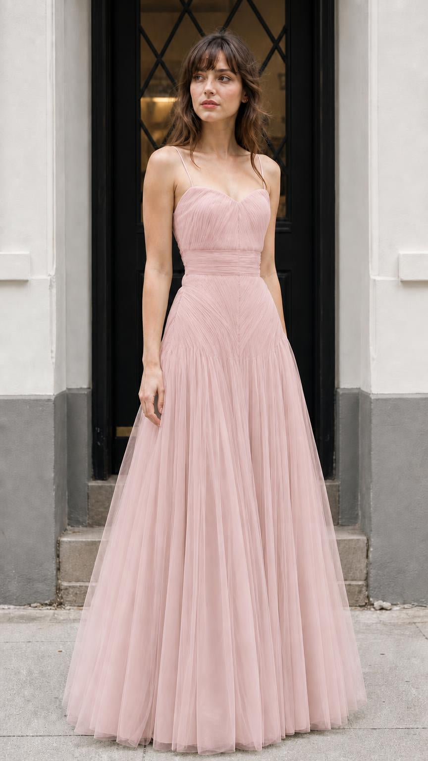 Front view of model wearing dusty pink tulle maxi dress