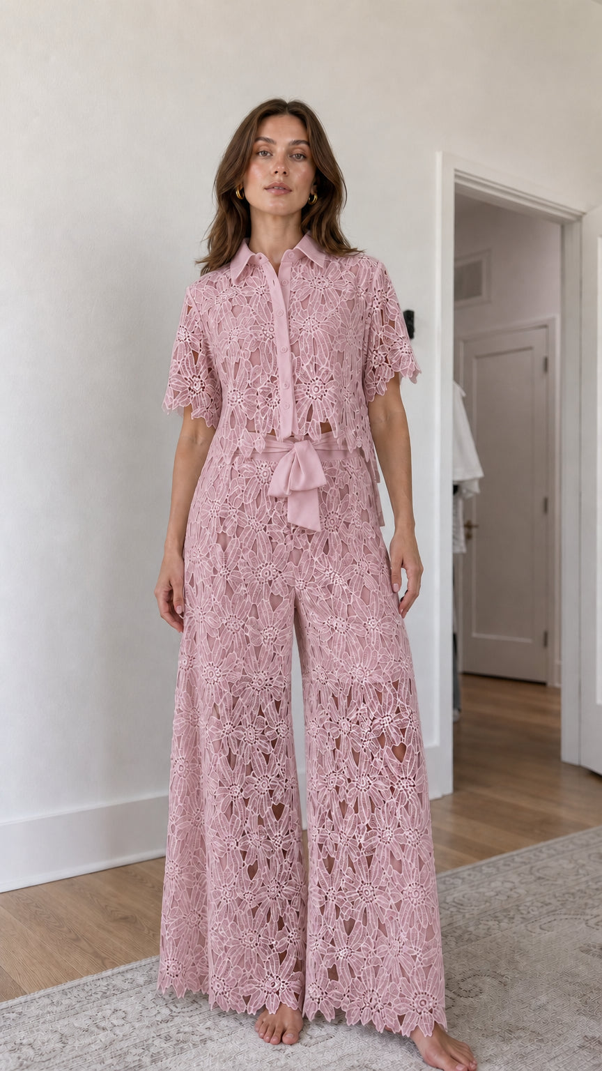Woman wearing pink floral lace shirt and wide-leg pants set