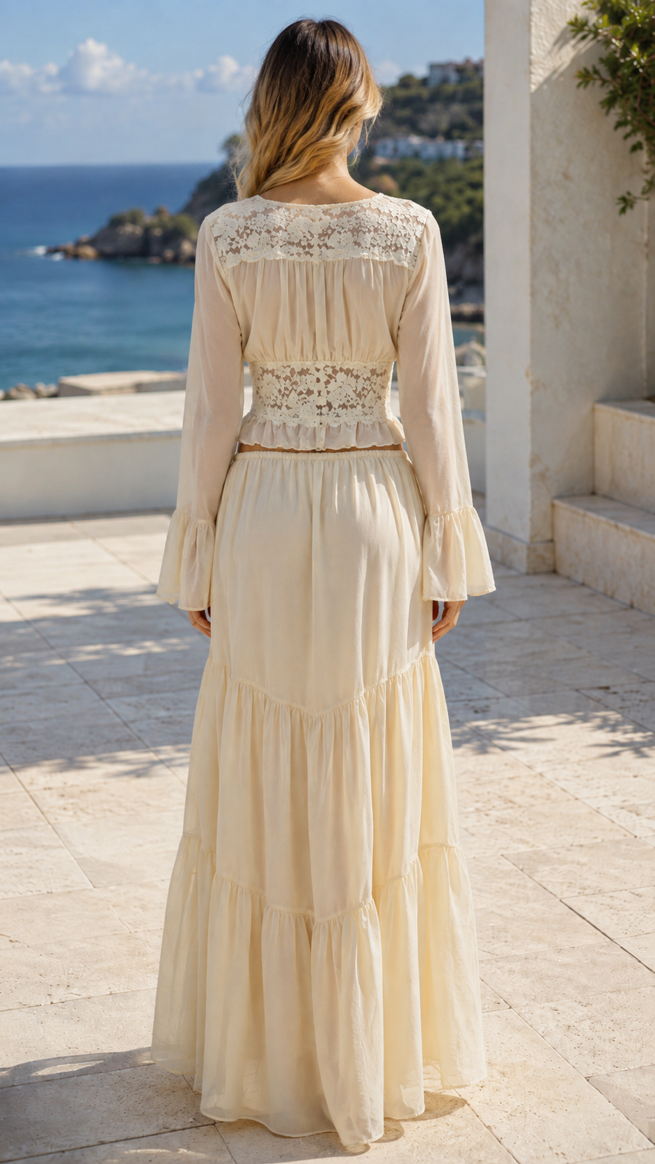 Back view of model wearing beige boho two-piece maxi set