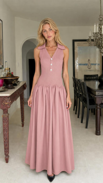 Woman wearing dusty pink collared maxi dress
