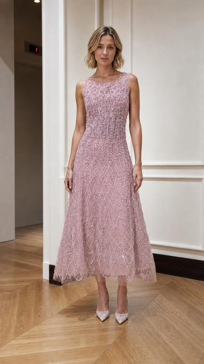 Blush pink embellished sleeveless A-line midi dress shown from the front