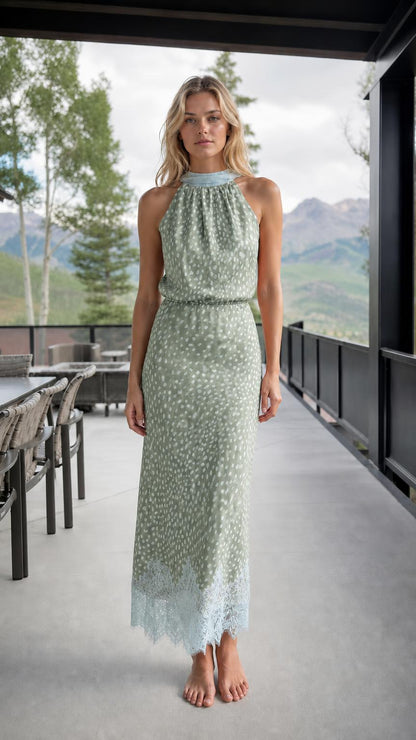 Front view of sage green printed halter neck maxi dress