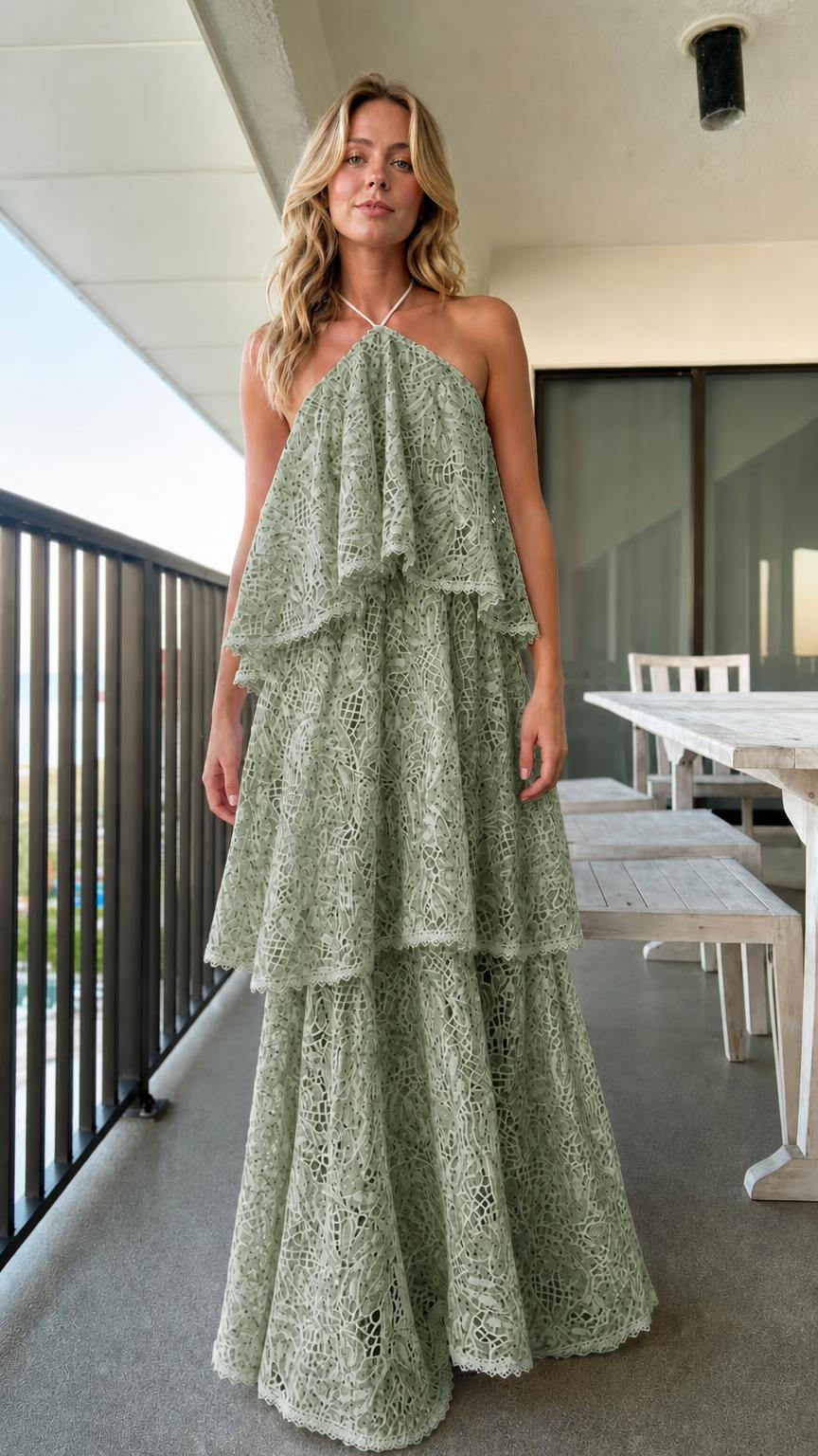Model wearing sage green tiered halter lace maxi dress