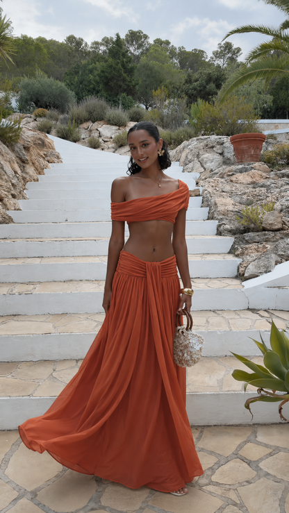 Terracotta off-shoulder crop top and maxi skirt set with sweeping hem