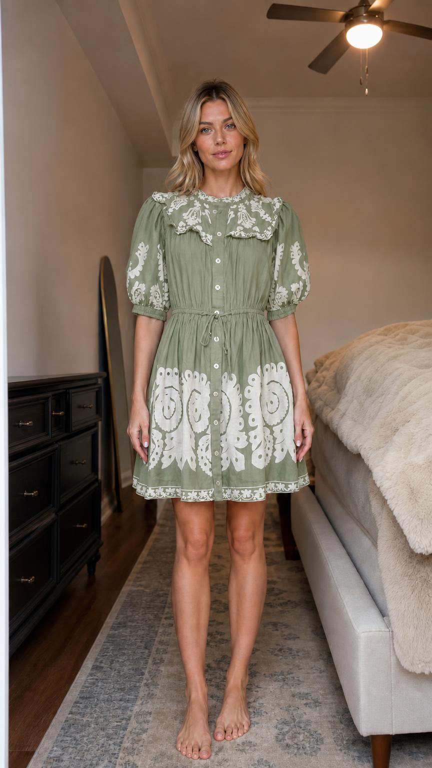 Front view of sage green boho embroidered mini dress