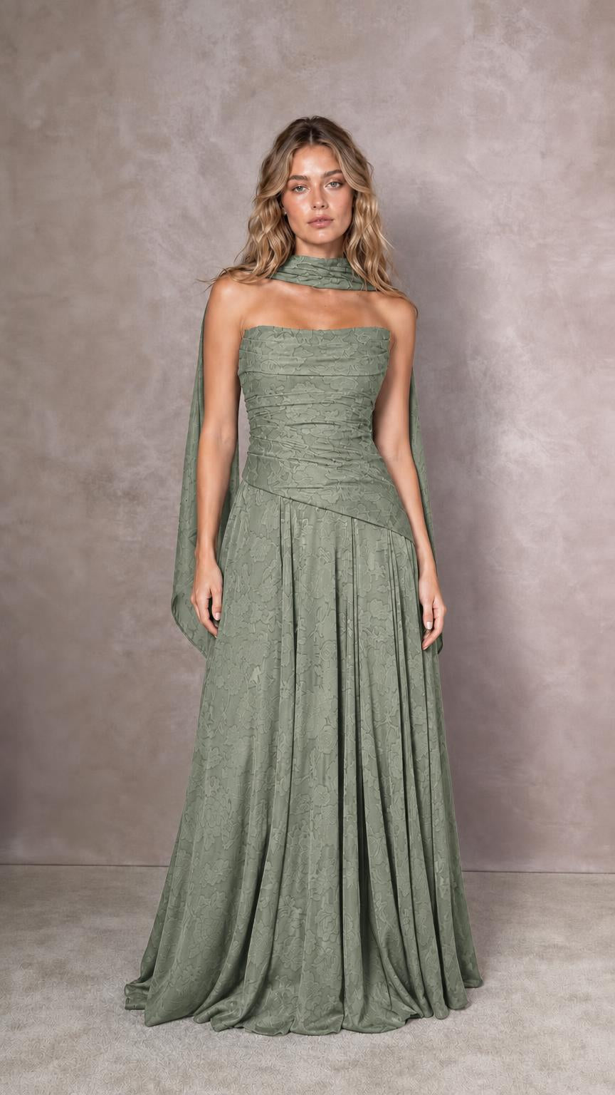 Front view of model wearing sage green strapless evening dress