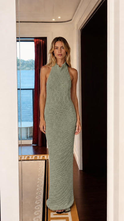 Model wearing sage green color variant of mock neck knit maxi dress