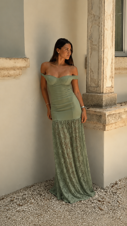 Front view of sage off-shoulder ruched maxi dress with textured lace-look hem