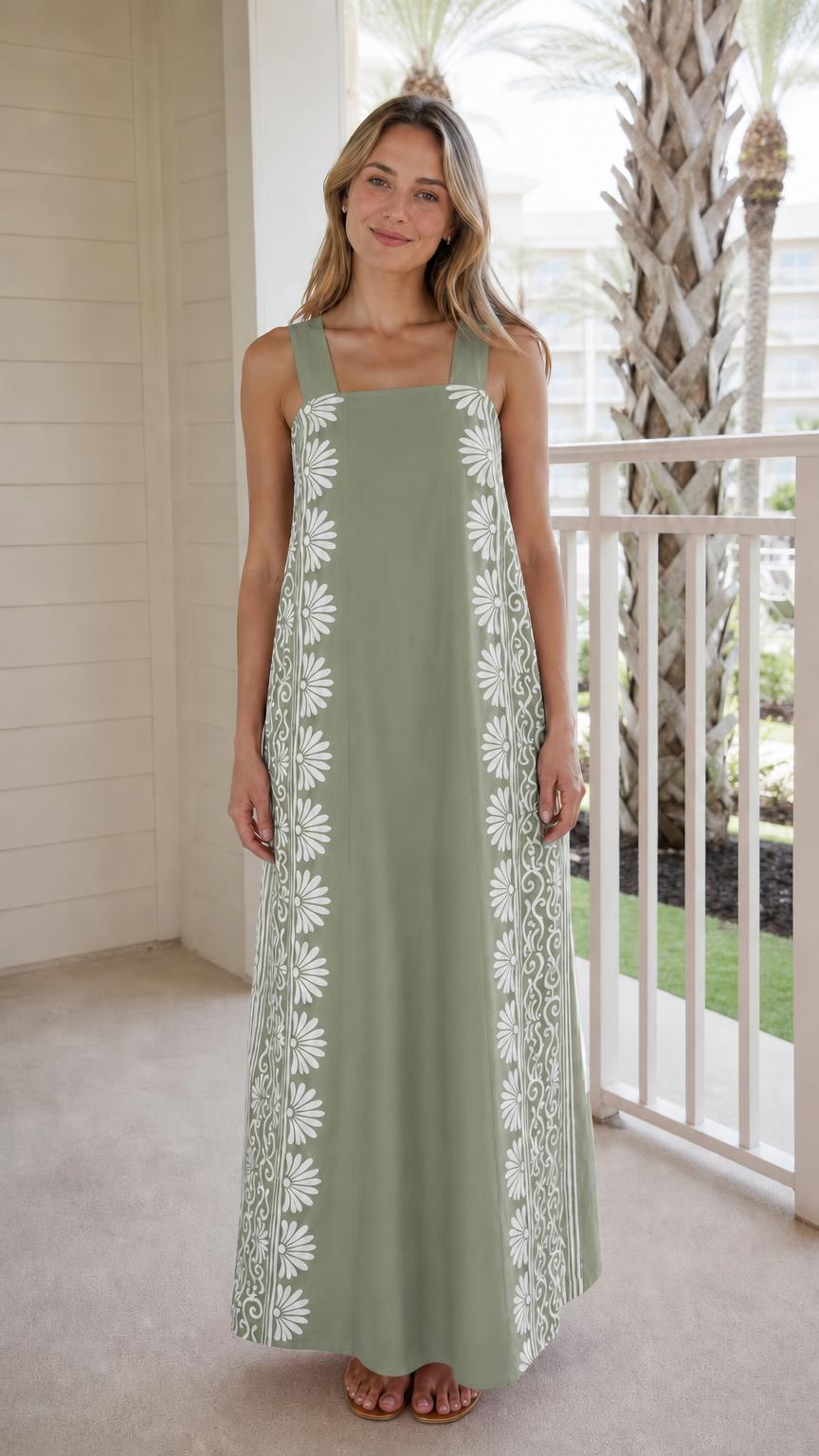 Woman wearing sage green maxi dress with side print panels