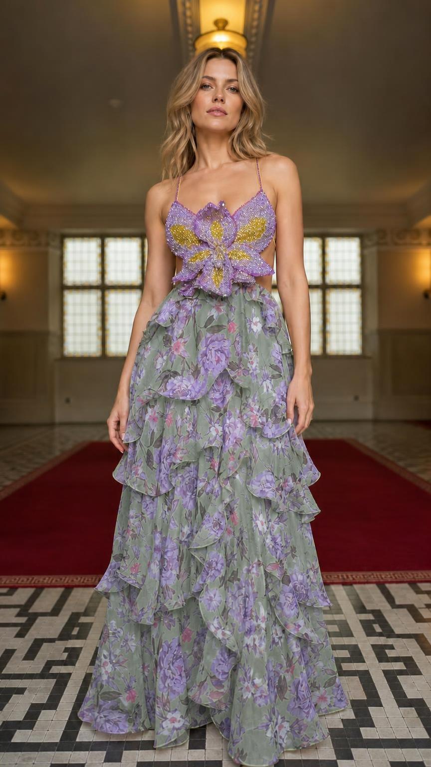 Model wearing sage floral ruffle maxi dress with beaded bodice