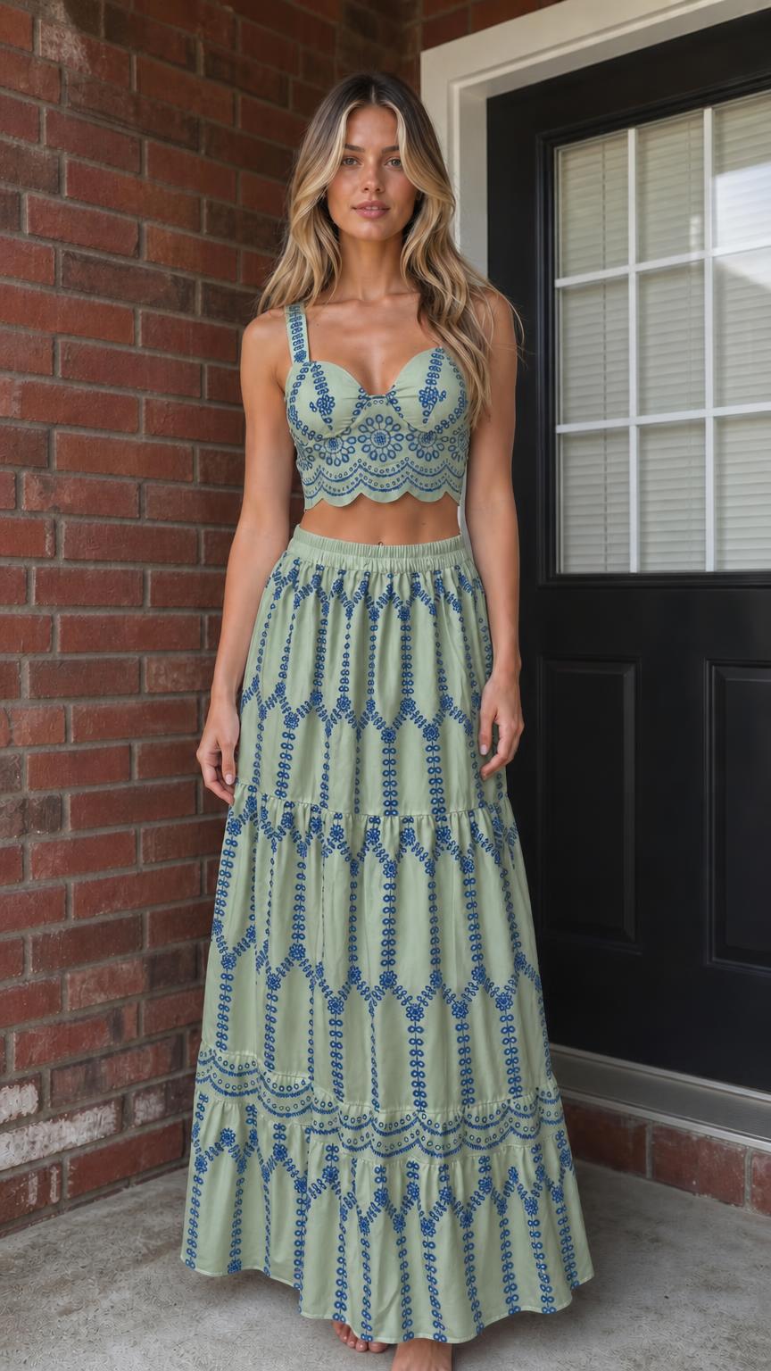 Woman wearing sage green and blue embroidered two-piece set