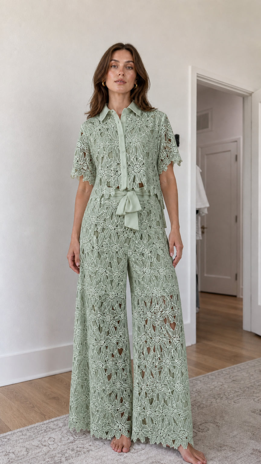 Woman wearing sage green floral lace shirt and wide-leg pants set