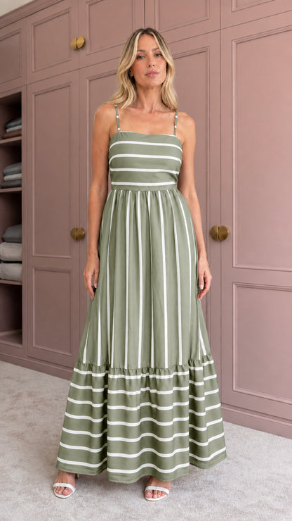 Woman wearing sage green striped tiered maxi dress