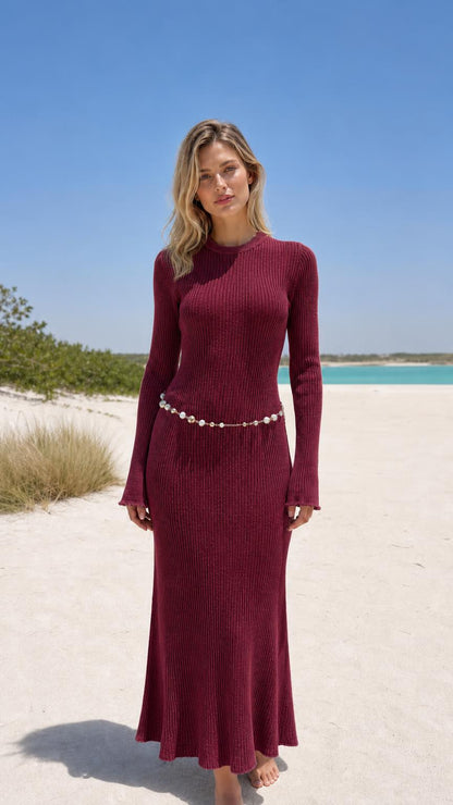 Model wearing burgundy ribbed knit maxi dress