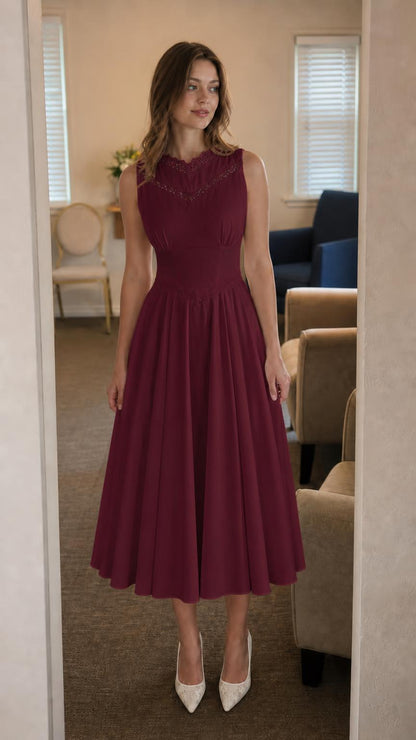 Front view of model wearing burgundy lace trim midi dress