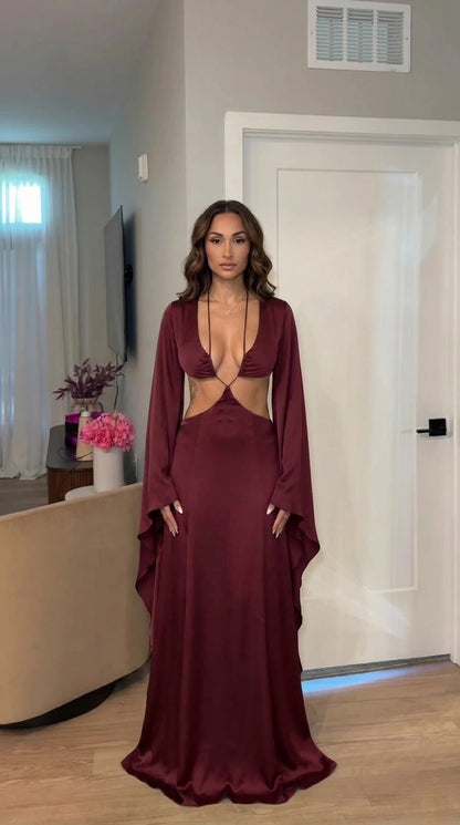 Front view of model wearing burgundy cutout maxi dress