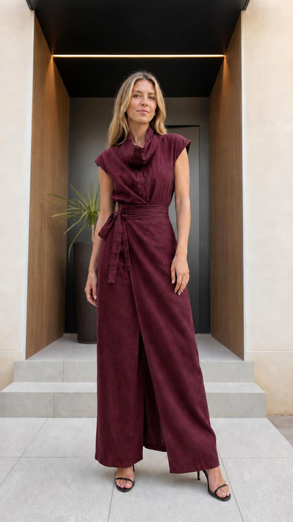 Front view of woman wearing burgundy wide-leg jumpsuit