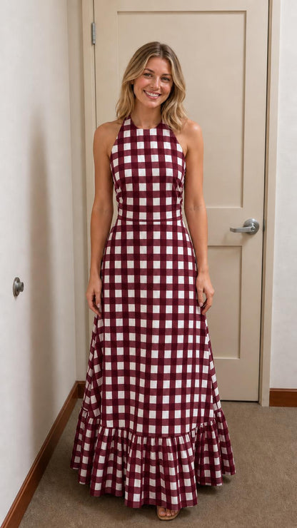 Front view of woman wearing burgundy and white gingham maxi dress