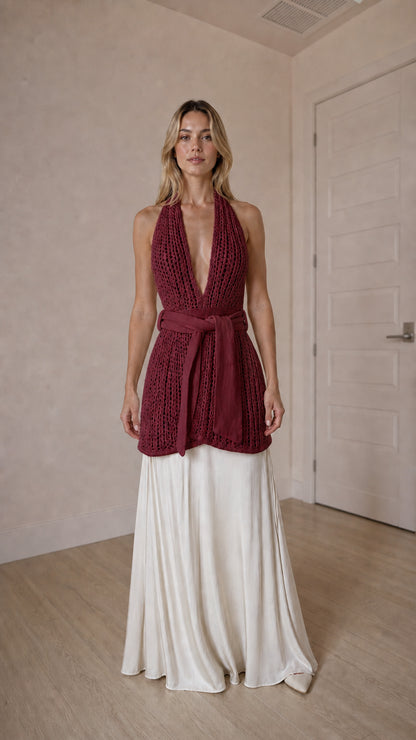 Front view of burgundy open knit halter top and maxi skirt set