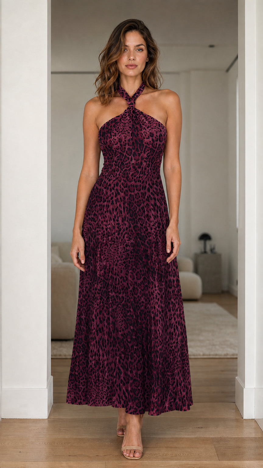 Model wearing burgundy variant of the leopard print maxi dress