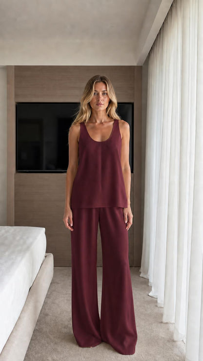 Front view of model wearing burgundy lounge set