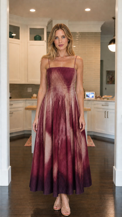 Model wearing burgundy ombre smocked maxi dress