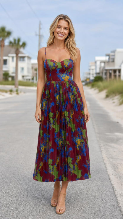 Model wearing burgundy floral print bustier pleated midi dress
