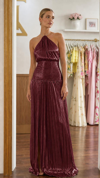 Front view of burgundy metallic pleated halter maxi dress